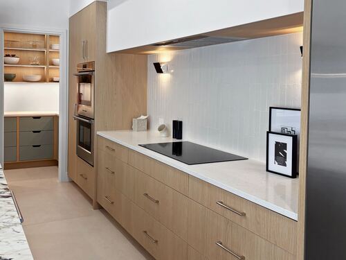 Kitchen remodel with custom cabinetry and countertops