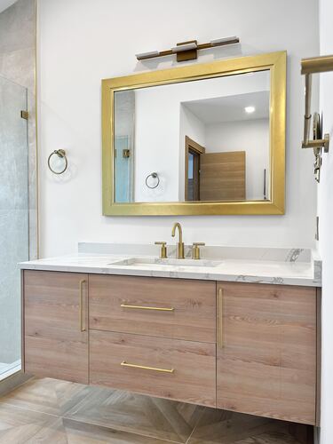 Bathroom remodel with custom cabinetry and finishes