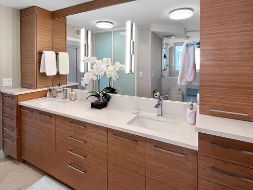 Bathroom remodel with custom storage and finishes
